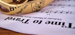 Sheet music titled Time to Travel with a gold ring