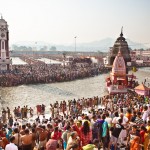 Crowds of pilgrims bathing in the Ganges